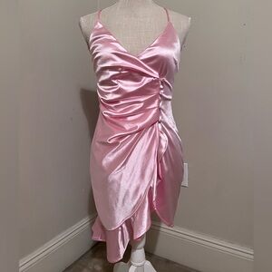 Better Be size small pink satin style dress with V-neck and ruffles.